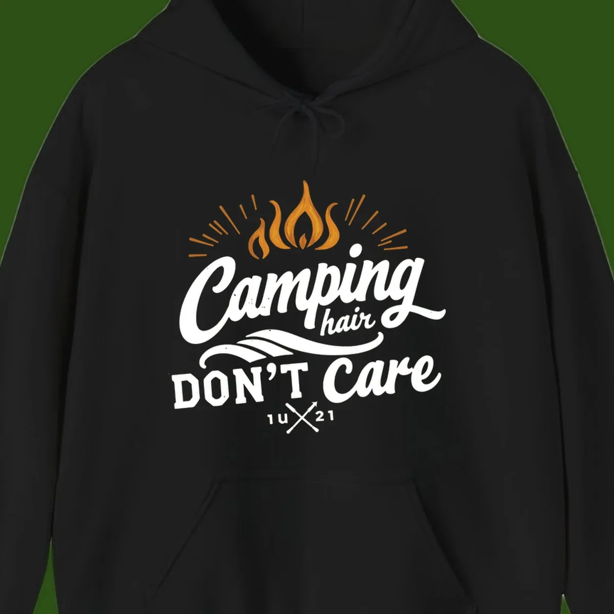 Camping hair don't care design with orange flame and radiating light rays in white lettering on gray background