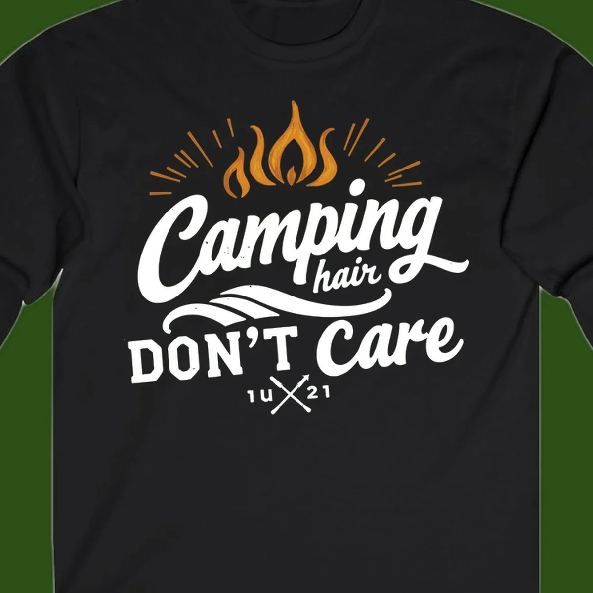 Camping hair don't care design with orange flame and radiating light rays in white lettering on gray background