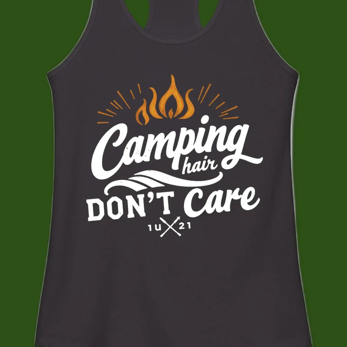 Camping hair don't care design with orange flame and radiating light rays in white lettering on gray background