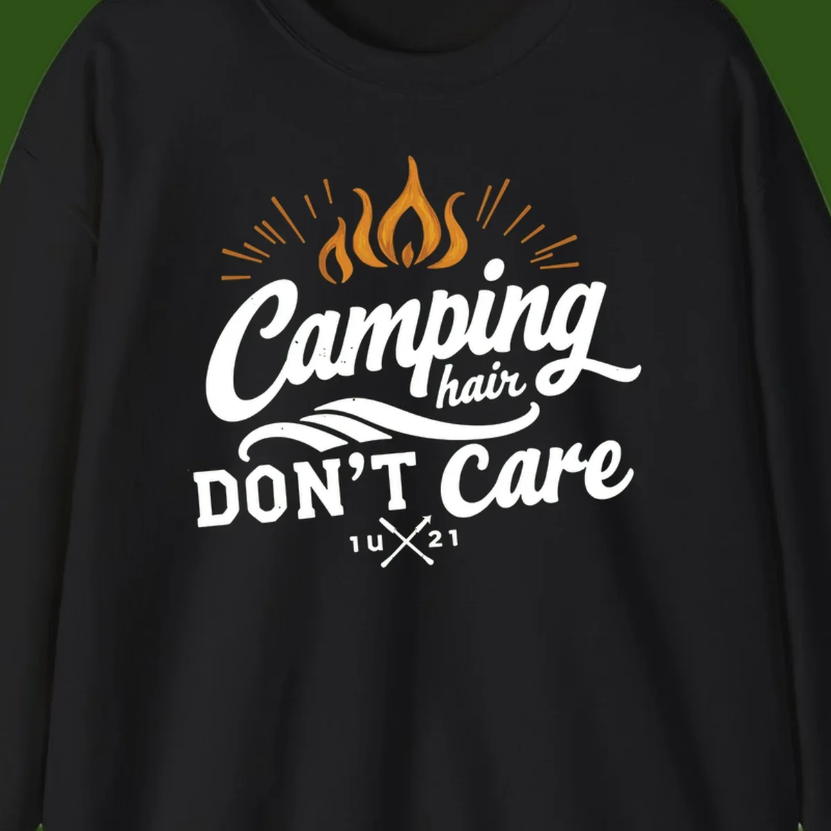 Camping hair don't care design with orange flame and radiating light rays in white lettering on gray background