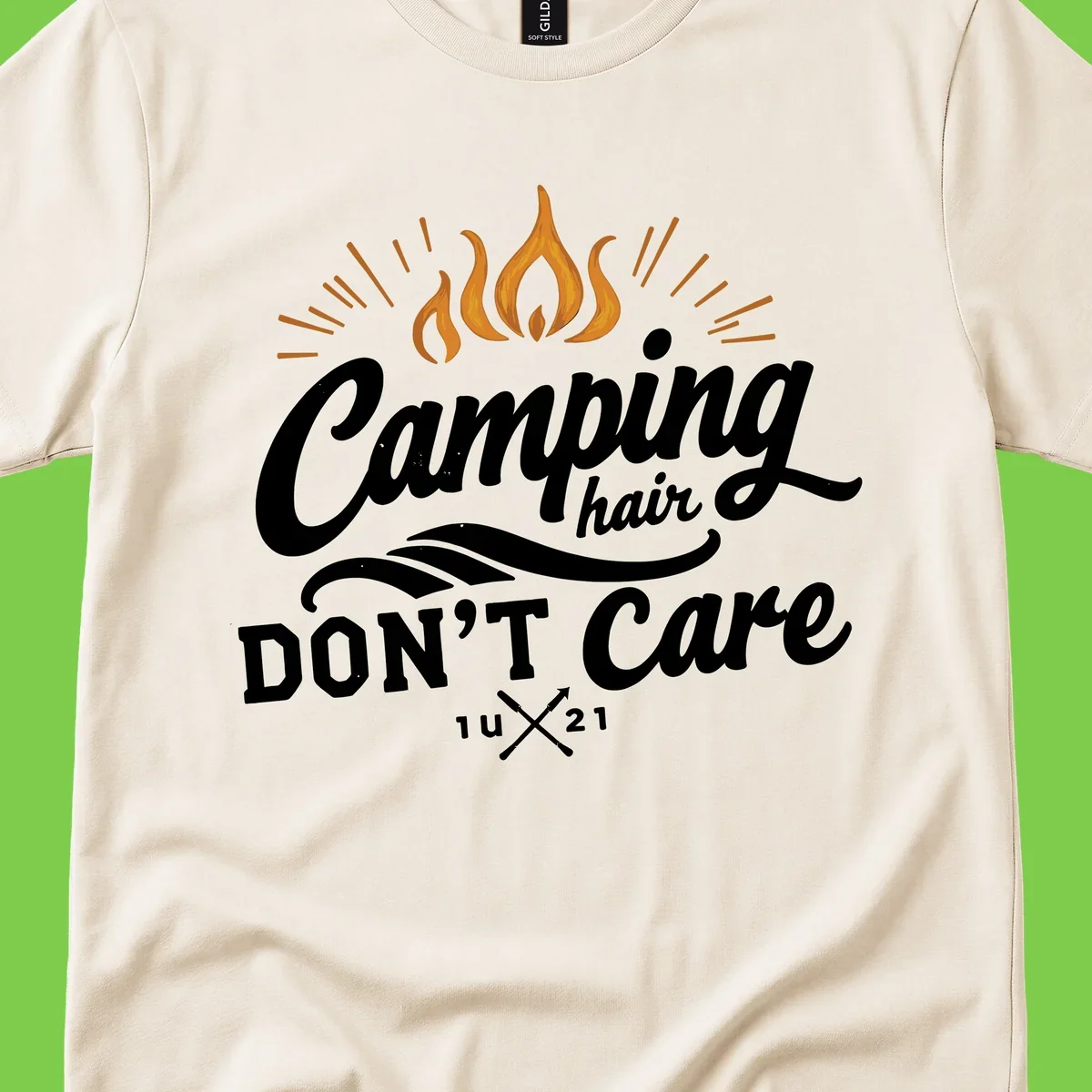Camping hair don't care design with orange flame and radiating light rays in white lettering on gray background