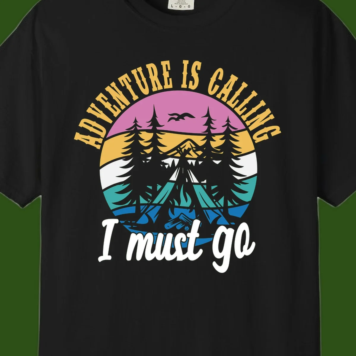 Circular badge with mountain landscape, evergreen trees, and flying birds in pink, gold, white, teal and blue with text 'Adventure Is Calling I Must Go'