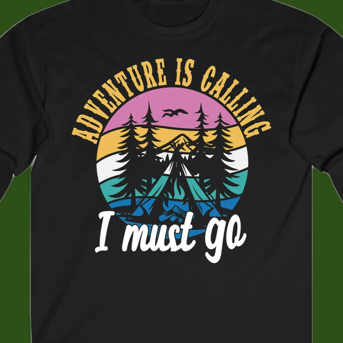 Circular badge with mountain landscape, evergreen trees, and flying birds in pink, gold, white, teal and blue with text 'Adventure Is Calling I Must Go'