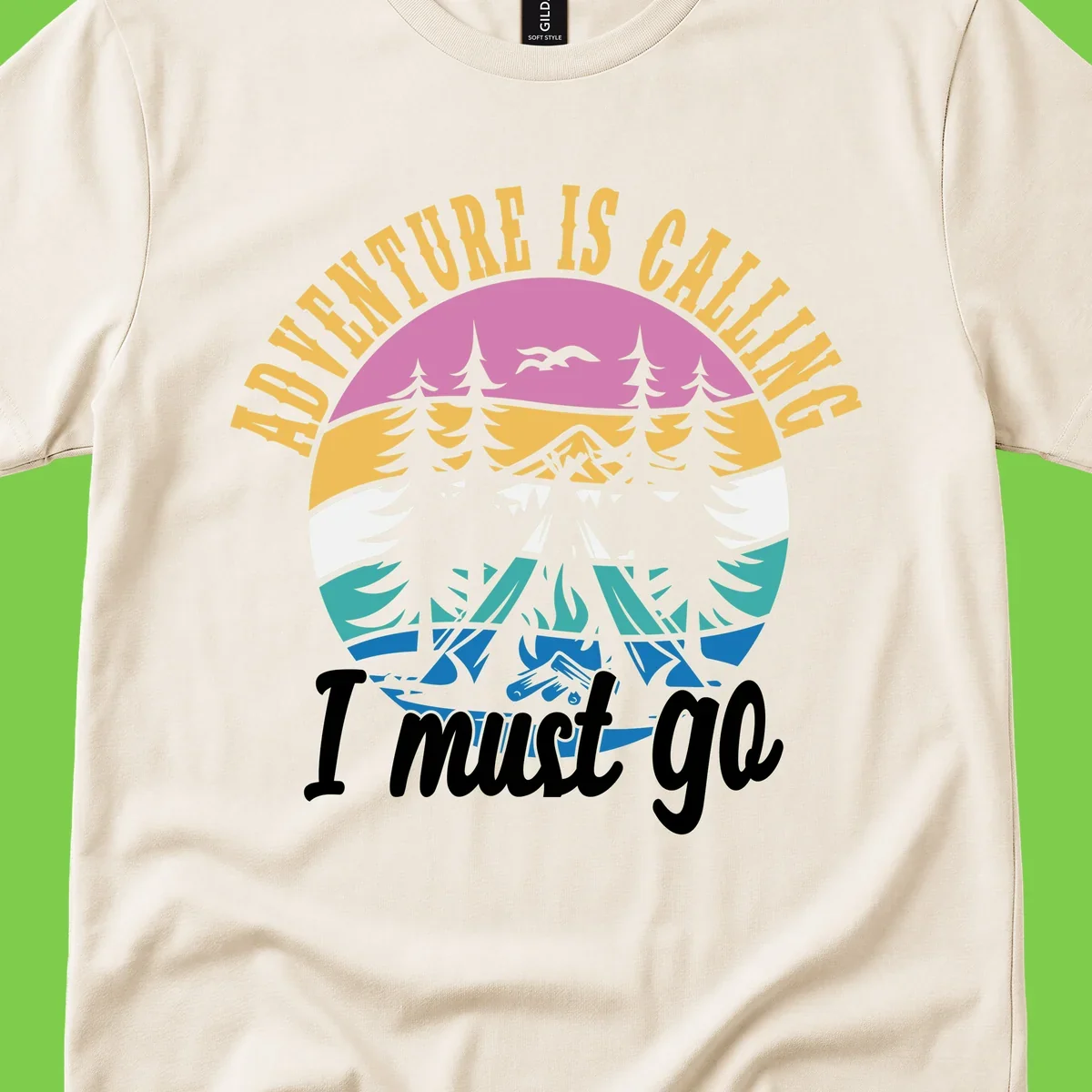 Circular badge with mountain landscape, evergreen trees, and flying birds in pink, gold, white, teal and blue with text 'Adventure Is Calling I Must Go'