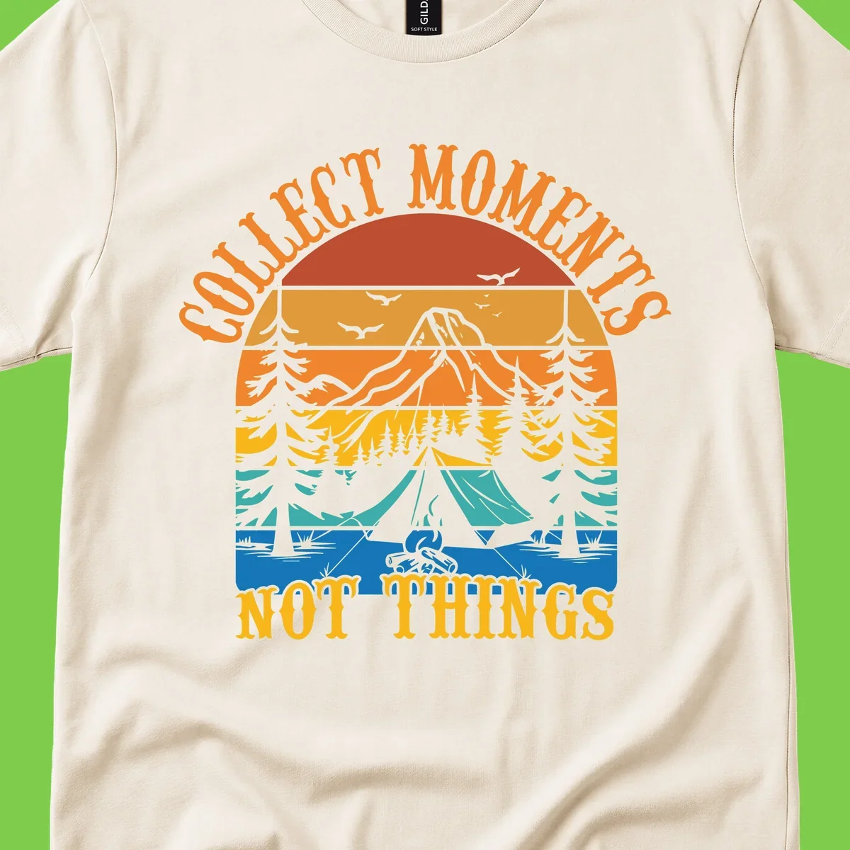 Retro layered landscape showing sunset, mountains, forest, tent and campfire with 'Quiet Mornings Not Things' text