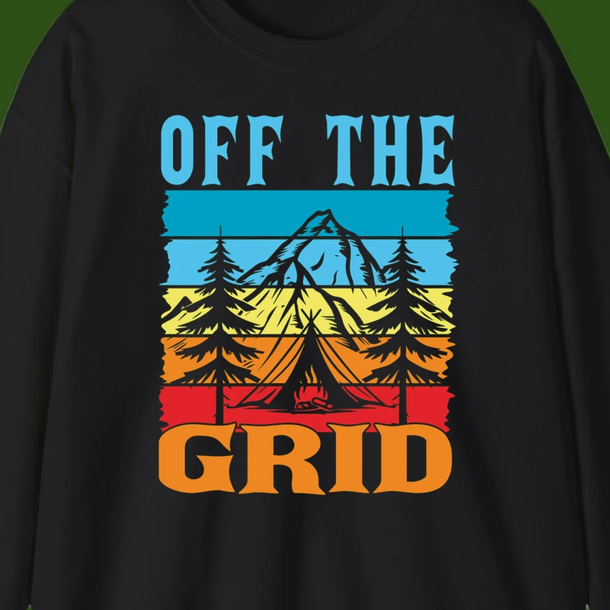 Colorful layered landscape illustration with tree, mountain, campfire, and roots design for off the grid camping shirt