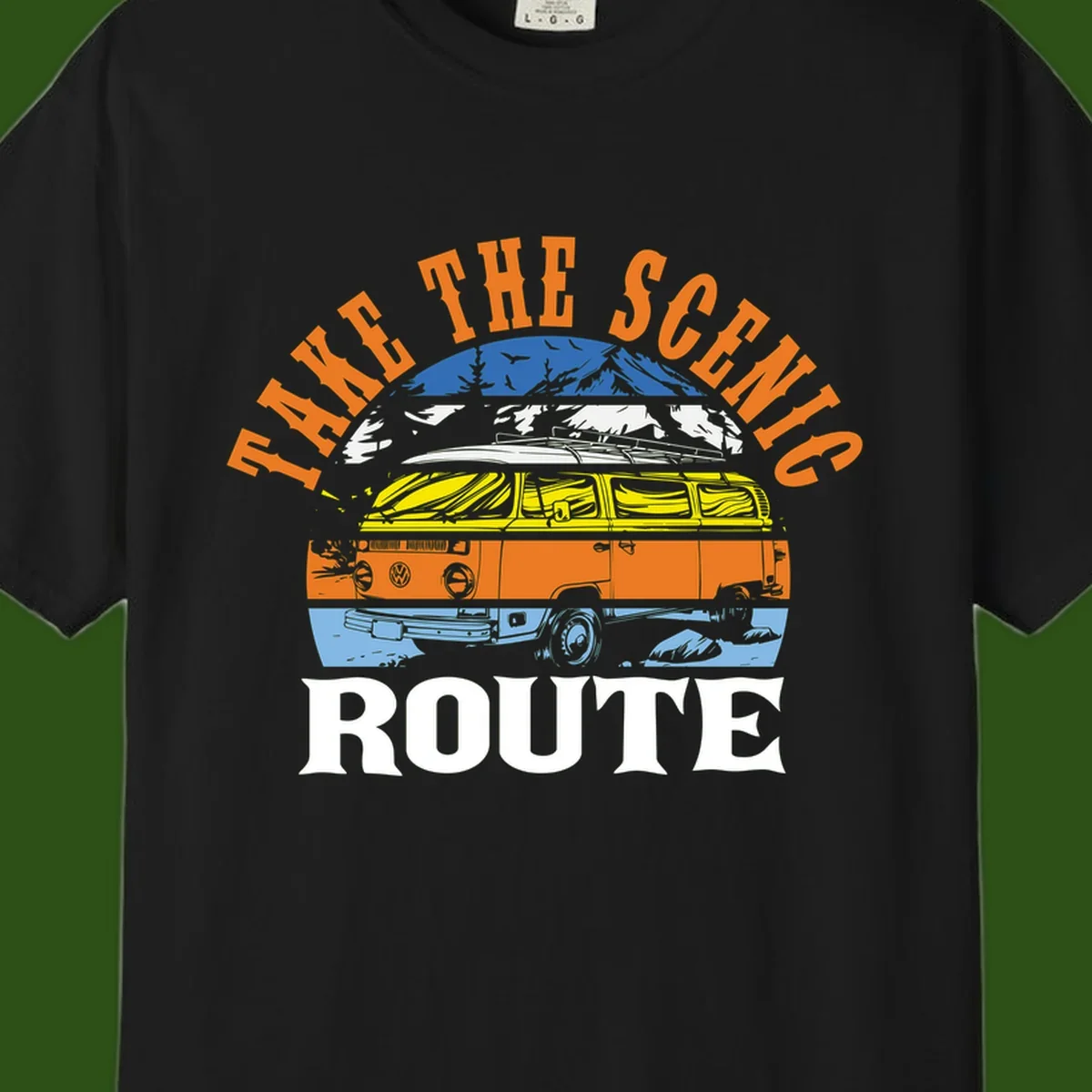Stacked illustration showing mountain peak, kayak, VW camper bus, and vintage car with 'Hike The Seven Route' text for adventure travel apparel.