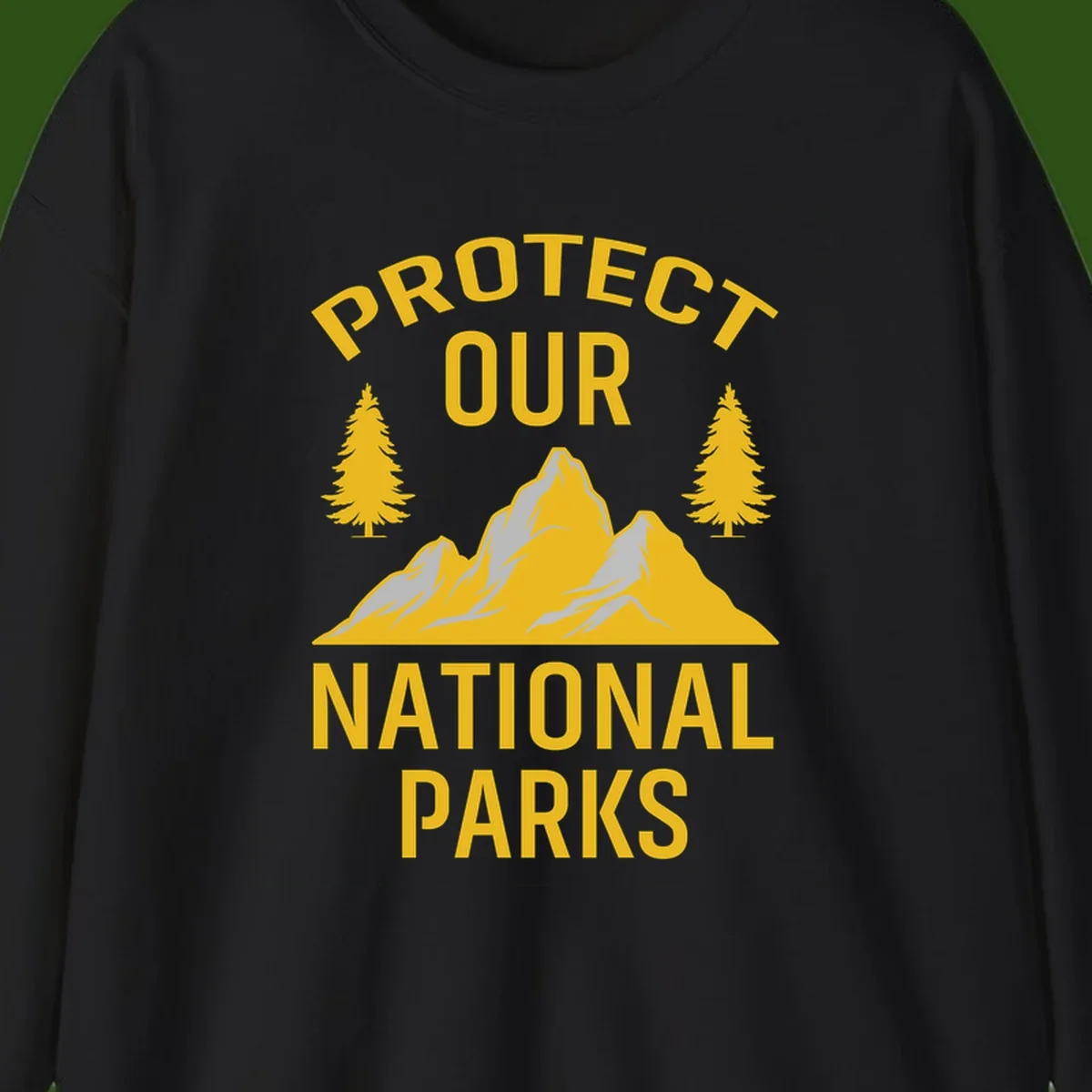 Protect our national parks design with golden mountains, evergreen trees, and bold text on gray background