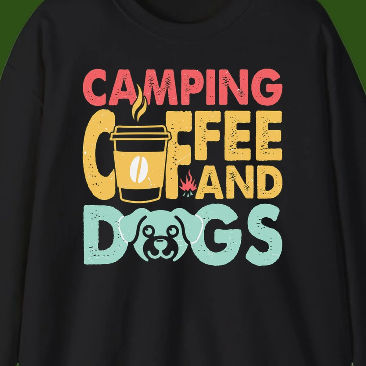 Distressed design with 'CAMPING COFFEE AND DOGS' text, yellow coffee cup with steam, red campfire, and mint green dog face illustration.