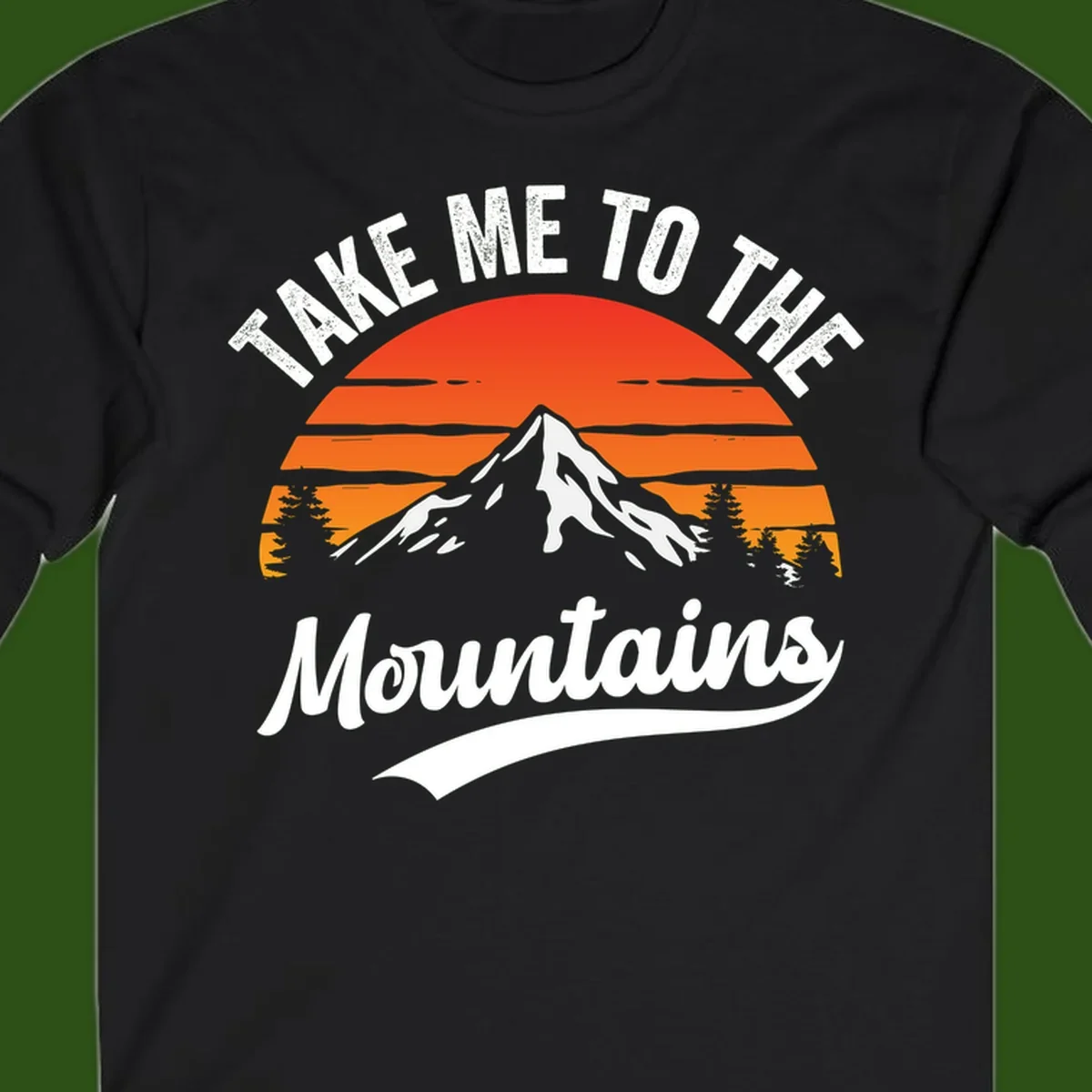 Vintage-style illustration of snow-capped mountain with sunset stripes and evergreen trees, text reading 'Take Me To The Mountains'