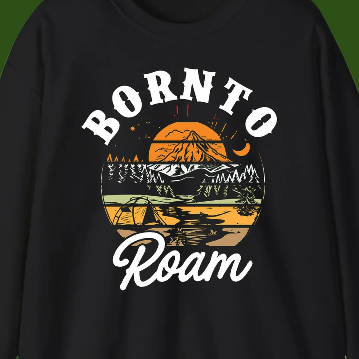 Born to roam camping design featuring layered mountain landscape with roots, forest, and campfire elements in orange, white, and gray.