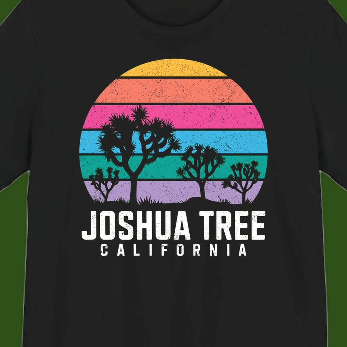 Joshua tree desert stripes design with silhouetted trees across rainbow horizontal color bands and distressed texture.