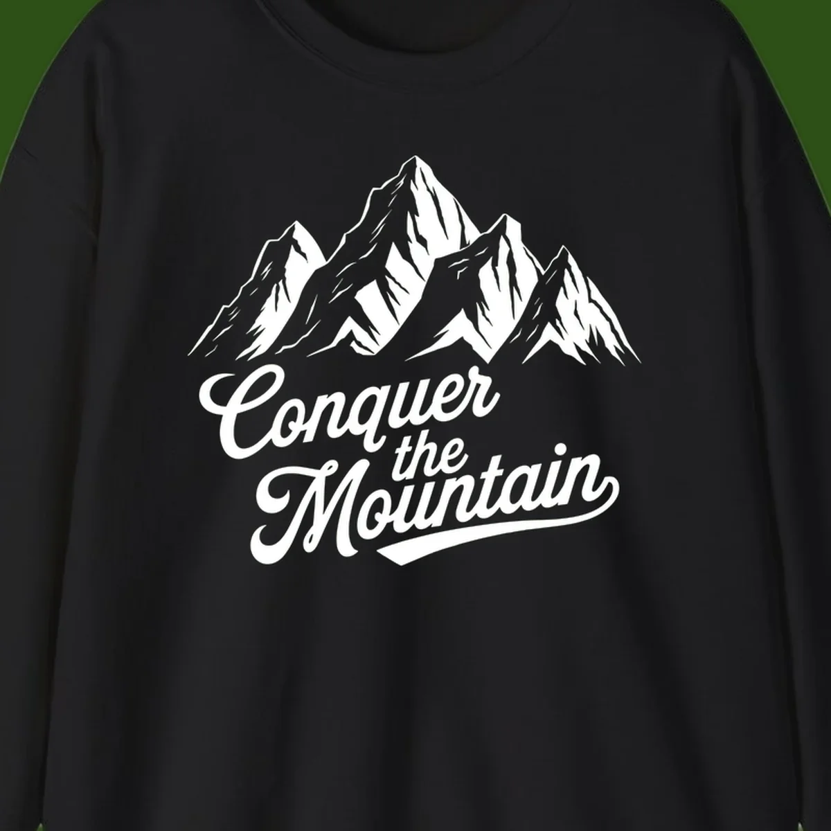 Vintage-style illustration of snow-capped mountain peaks with 'Conquer the Mountain' text in cursive script