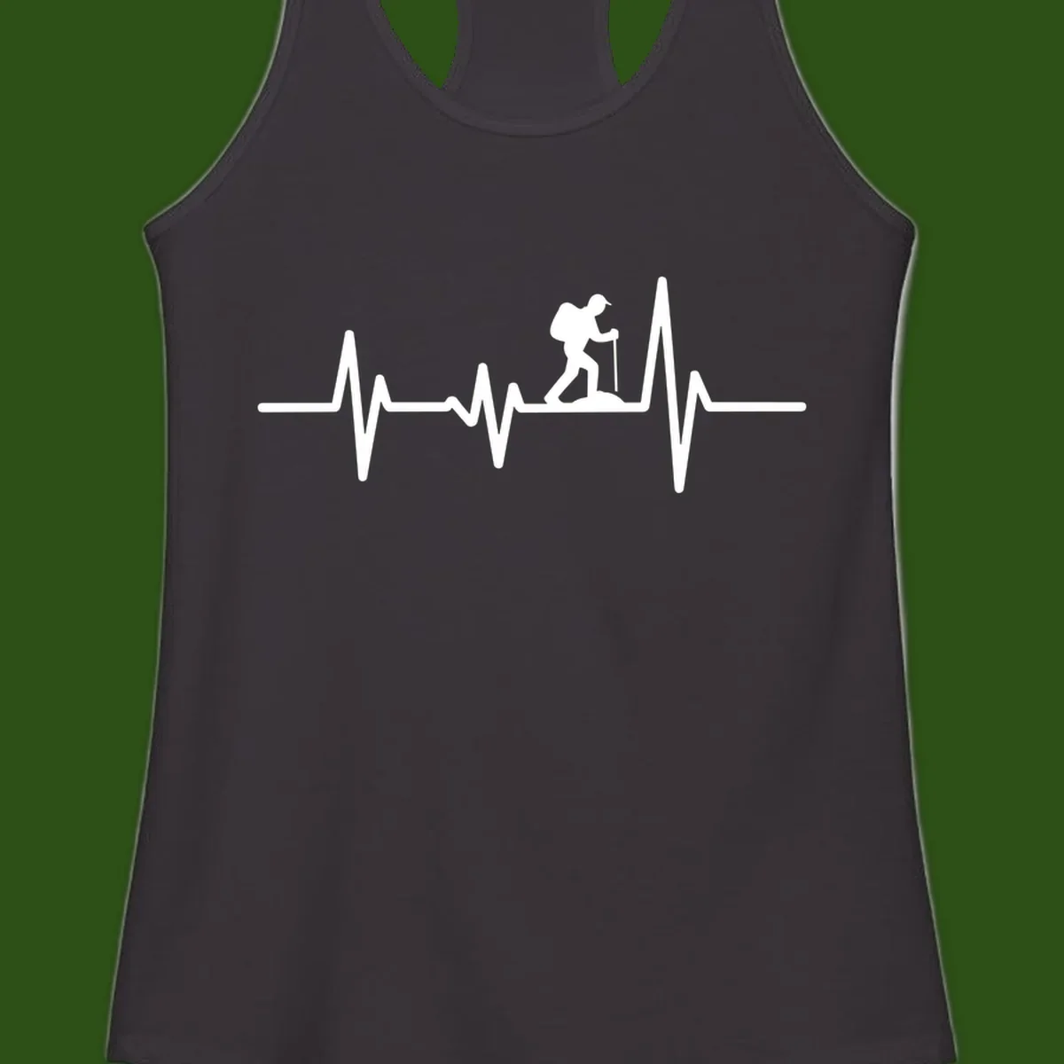 White hiking silhouette with backpack integrated into a heartbeat ECG line on gray background