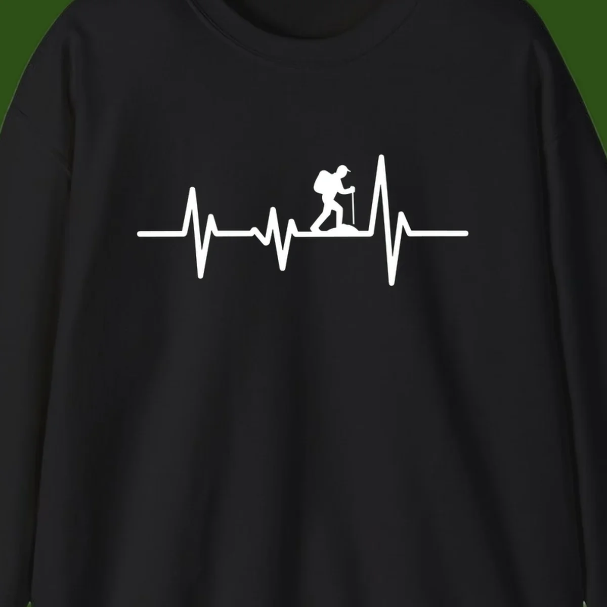 White hiking silhouette with backpack integrated into a heartbeat ECG line on gray background