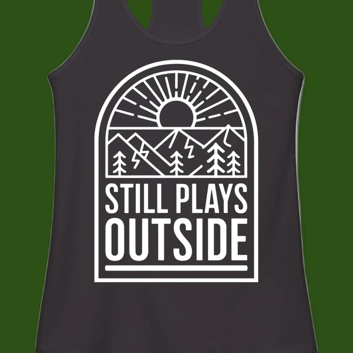 Still Plays Outside badge design featuring mountains, sun, pine trees, and lightning bolt in minimalist line art style