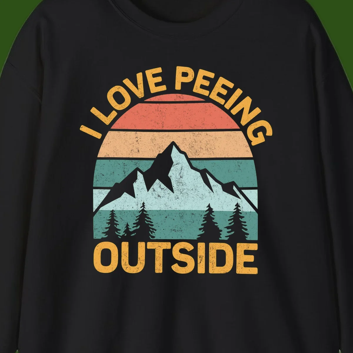 Retro sunset design with snow mountains and trees, text reads 'I Love Peeling Outside' in distressed gold lettering