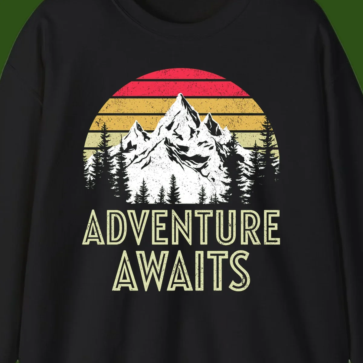 Retro adventure awaits design with snow-capped mountains, pine forest silhouettes, and vintage sunset stripes in distressed style.