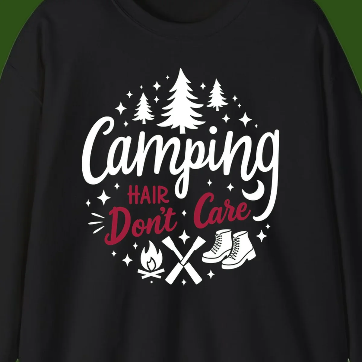 Camping hair don't care design with pine trees, campfire, boots, and script lettering on gray background