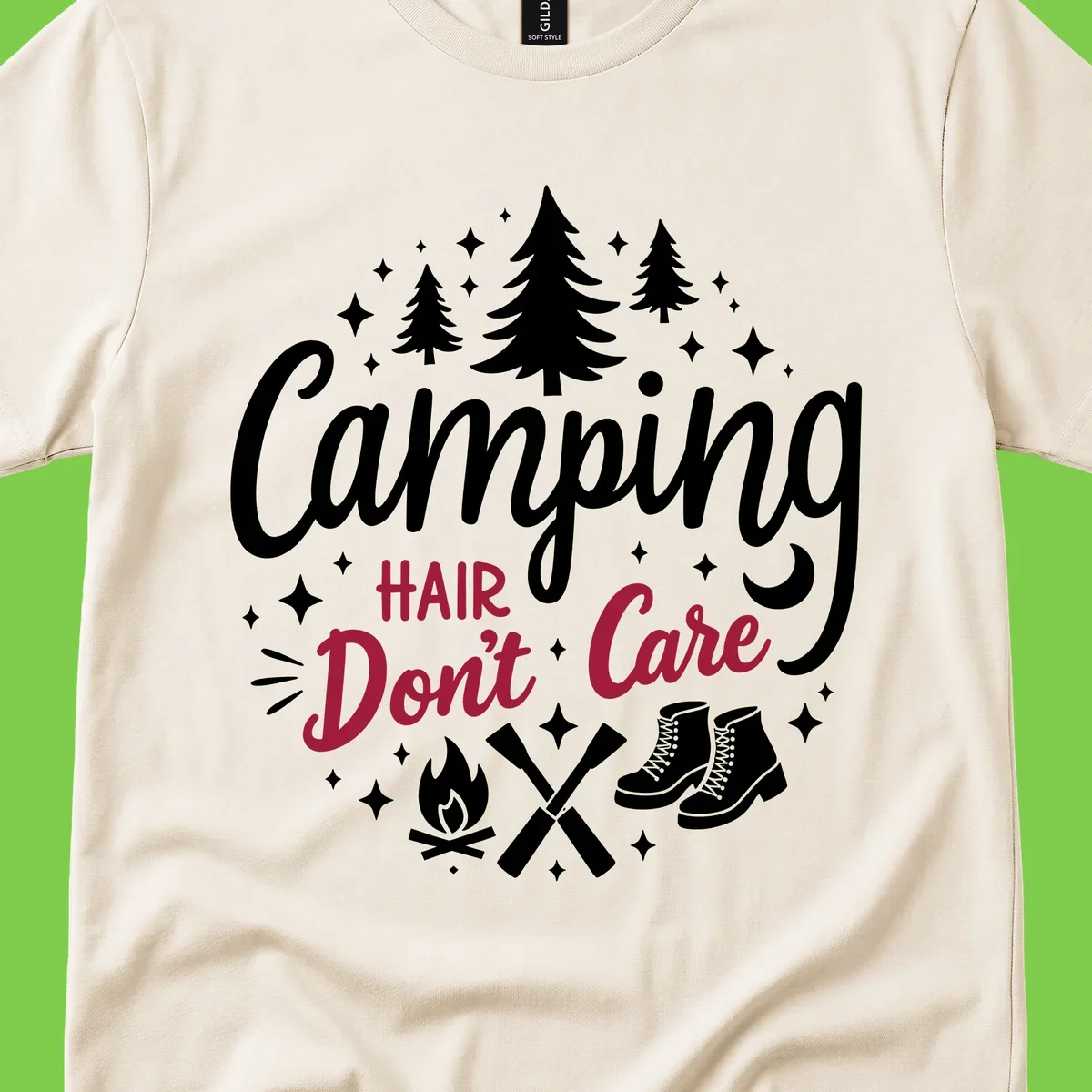 Camping hair don't care design with pine trees, campfire, boots, and script lettering on gray background