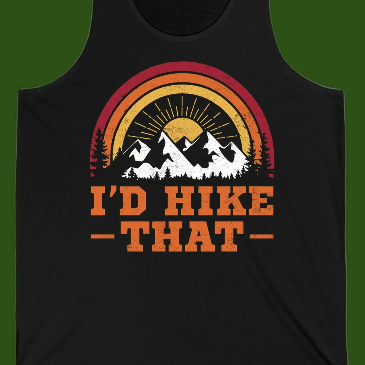 Vintage badge design with snow-capped mountains, evergreen trees, golden sun rays, and text reading 'I'd Hike That' in retro style