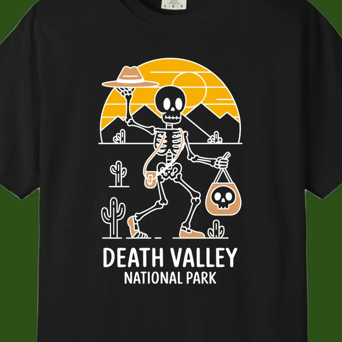 Skeleton cowboy holding skull pouch in Death Valley desert landscape with cacti, mountains, and golden sun rays