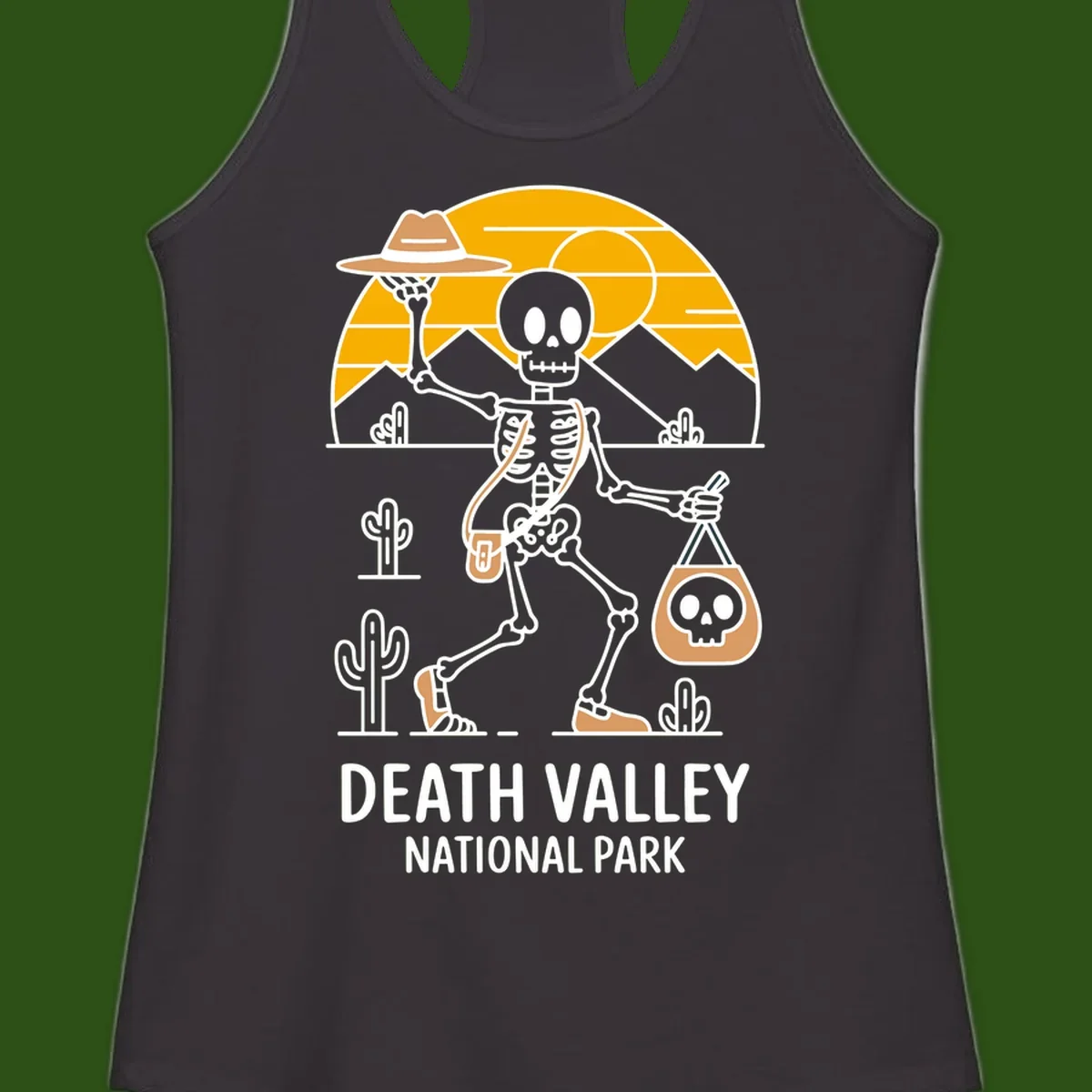 Skeleton cowboy holding skull pouch in Death Valley desert landscape with cacti, mountains, and golden sun rays