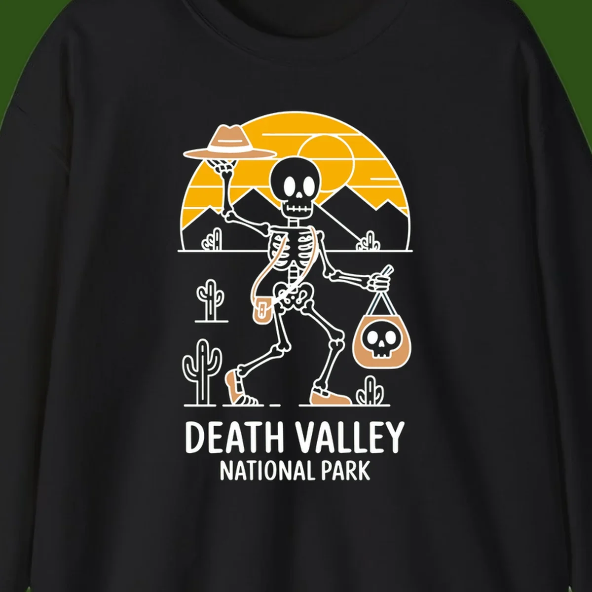 Skeleton cowboy holding skull pouch in Death Valley desert landscape with cacti, mountains, and golden sun rays