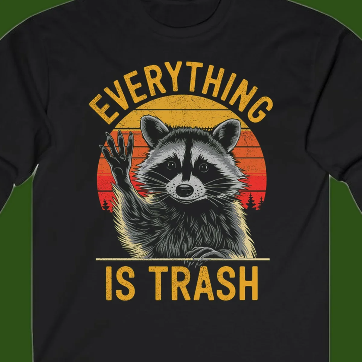 Vintage-style illustration of a raccoon with raised paw against retro sunset stripes, text reading 'Everything Is Trash' in distressed gold lettering