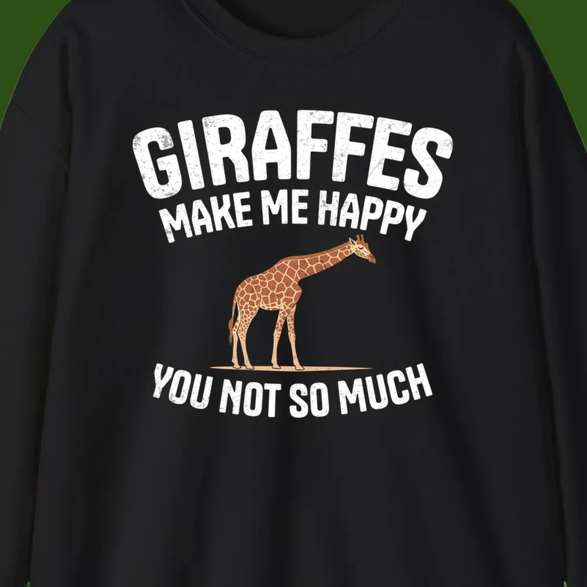 Giraffe make me happy design with distressed white text on gray background, humorous introvert-themed illustration