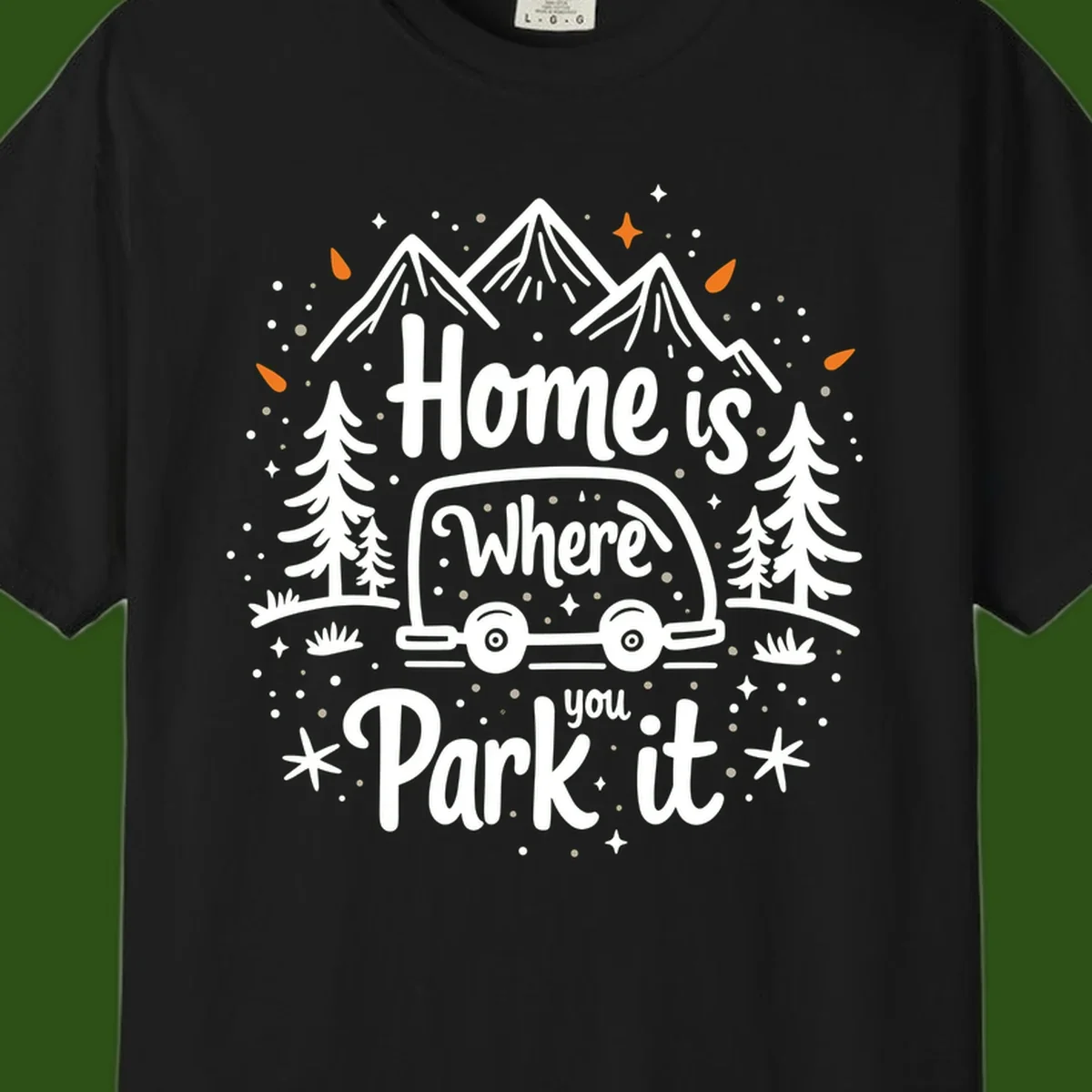 Illustrated winter camping scene with travel trailer, mountains, trees, and snowflakes with text 'Home is Where you Park it'