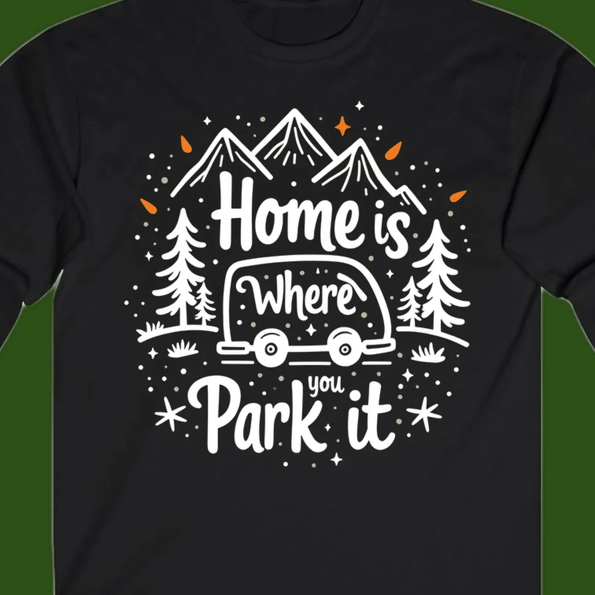 Illustrated winter camping scene with travel trailer, mountains, trees, and snowflakes with text 'Home is Where you Park it'