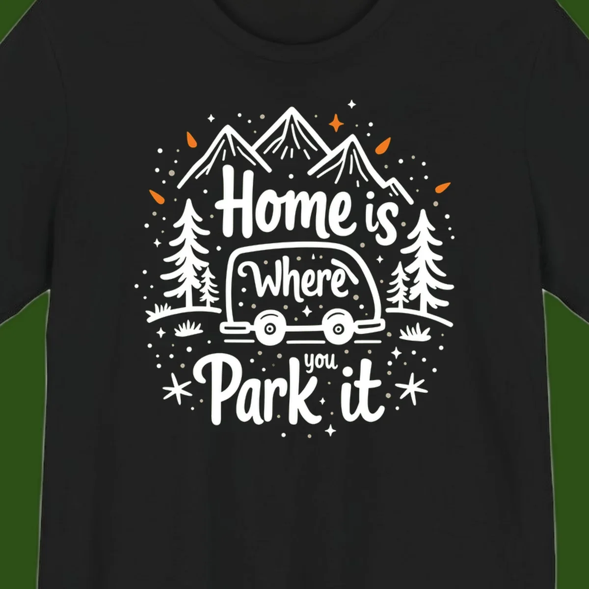 Illustrated winter camping scene with travel trailer, mountains, trees, and snowflakes with text 'Home is Where you Park it'