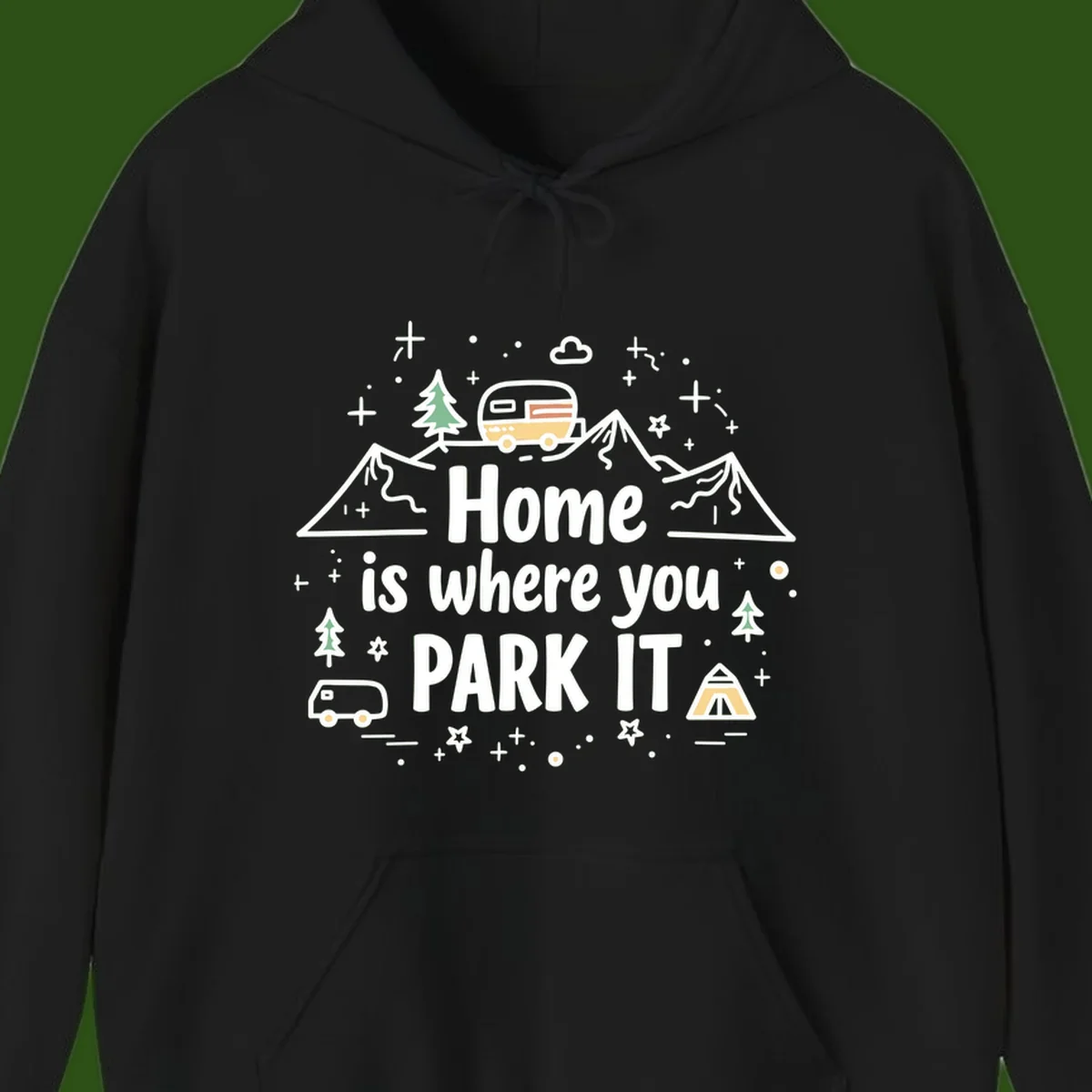 Illustrated design with vintage travel trailer parked on mountain road, evergreen trees, tent, and text reading 'Home is where you park it' on gray background.