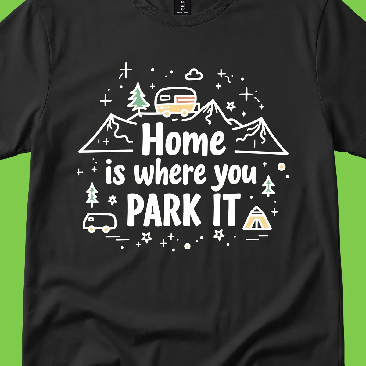 Illustrated design with vintage travel trailer parked on mountain road, evergreen trees, tent, and text reading 'Home is where you park it' on gray background.
