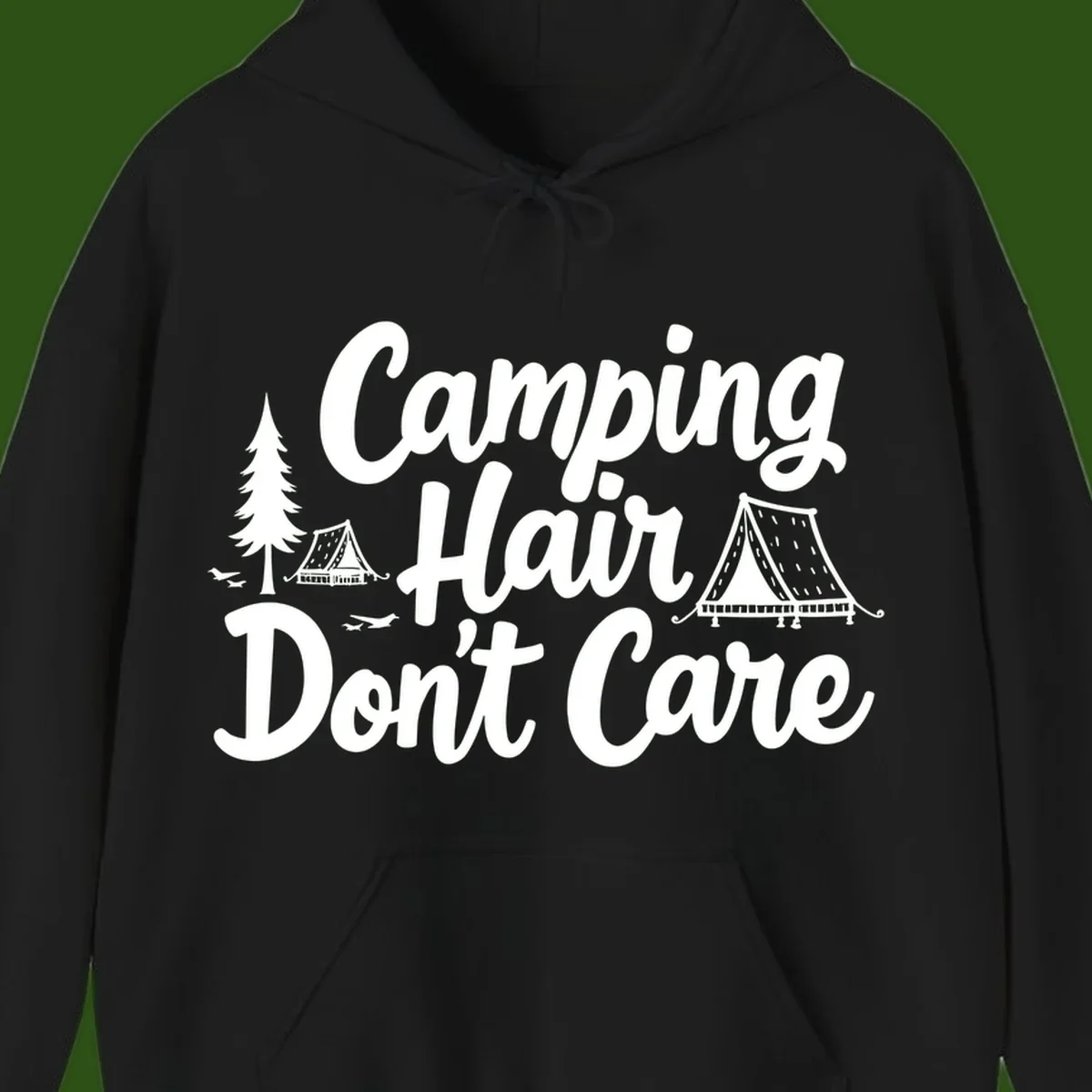 White text reading 'Camping Hair Don't Care' with illustrated tent and evergreen tree designs on gray background