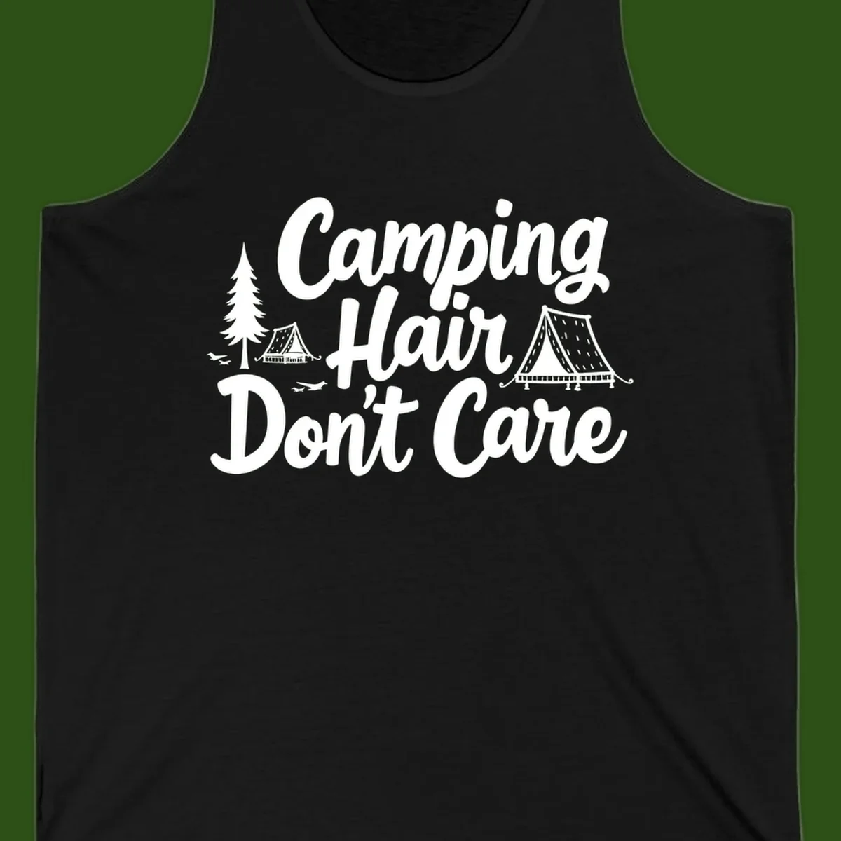 White text reading 'Camping Hair Don't Care' with illustrated tent and evergreen tree designs on gray background