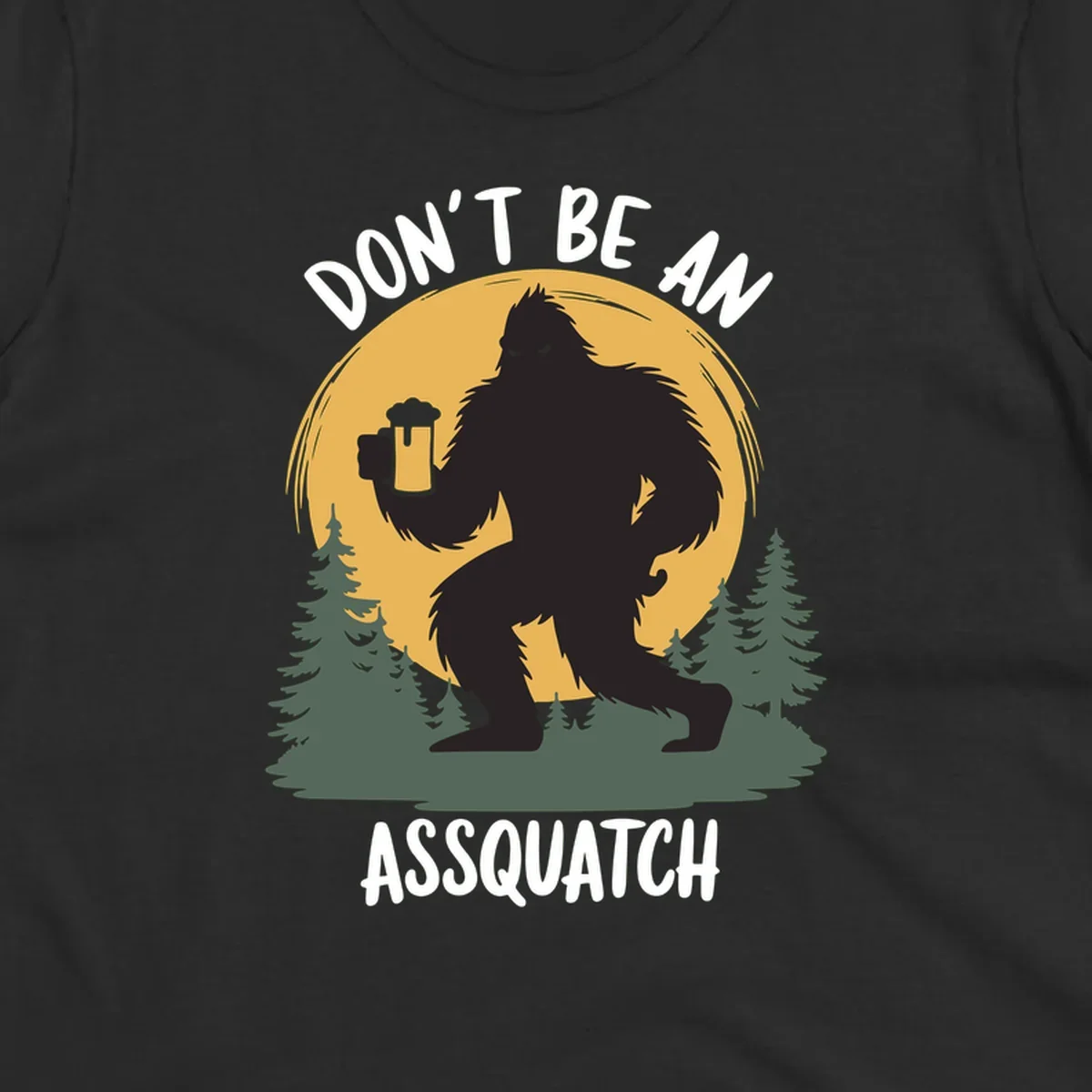 Black silhouette of Bigfoot holding a beer mug under a full moon with pine trees, text reads don't be an assquatch