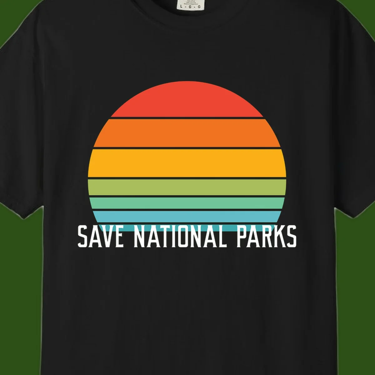 Retro layered sunset design with save national parks text in white, featuring horizontal color bands in red, orange, yellow, green, and blue.