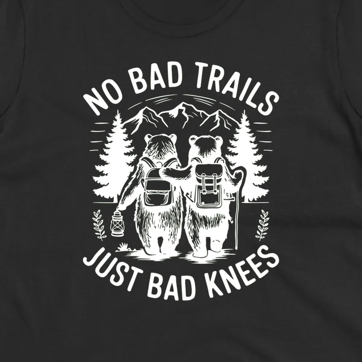 Two cartoon bears with backpacks hiking in mountains with text 'No Bad Trails Just Bad Knees' - humorous outdoor camping design