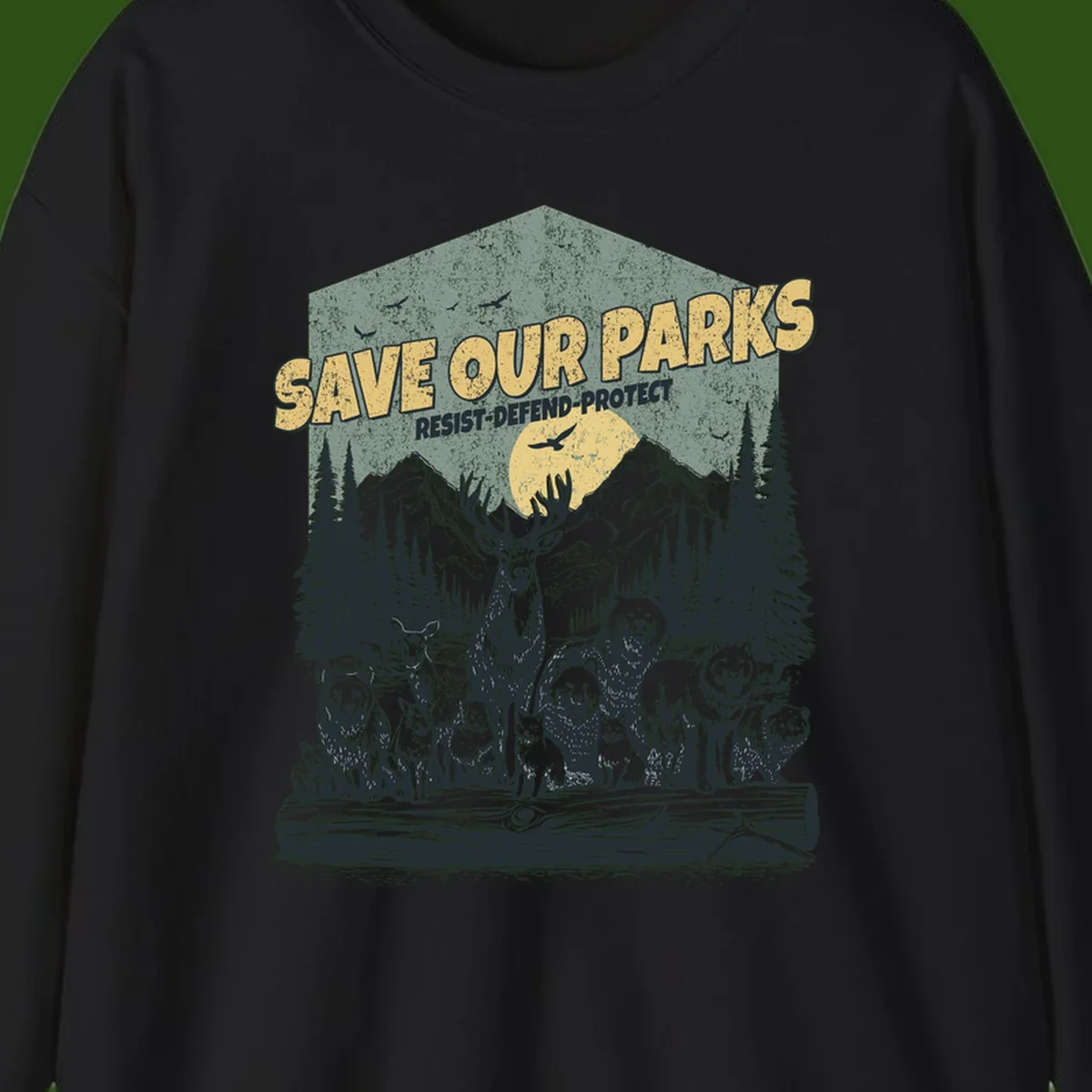 Vintage illustration of elk, bears, wolves and deer gathered in a moonlit forest with mountains, text reads 'Save Our Parks Resist-Defend-Protect'