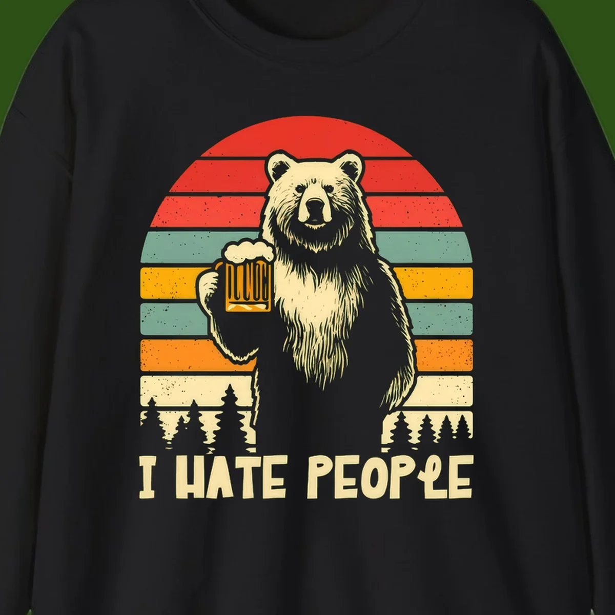 Retro illustration of a grizzly bear holding a beer mug against colorful horizontal stripes with forest and mountain silhouettes, text reads 'I HATE PEOPLE'