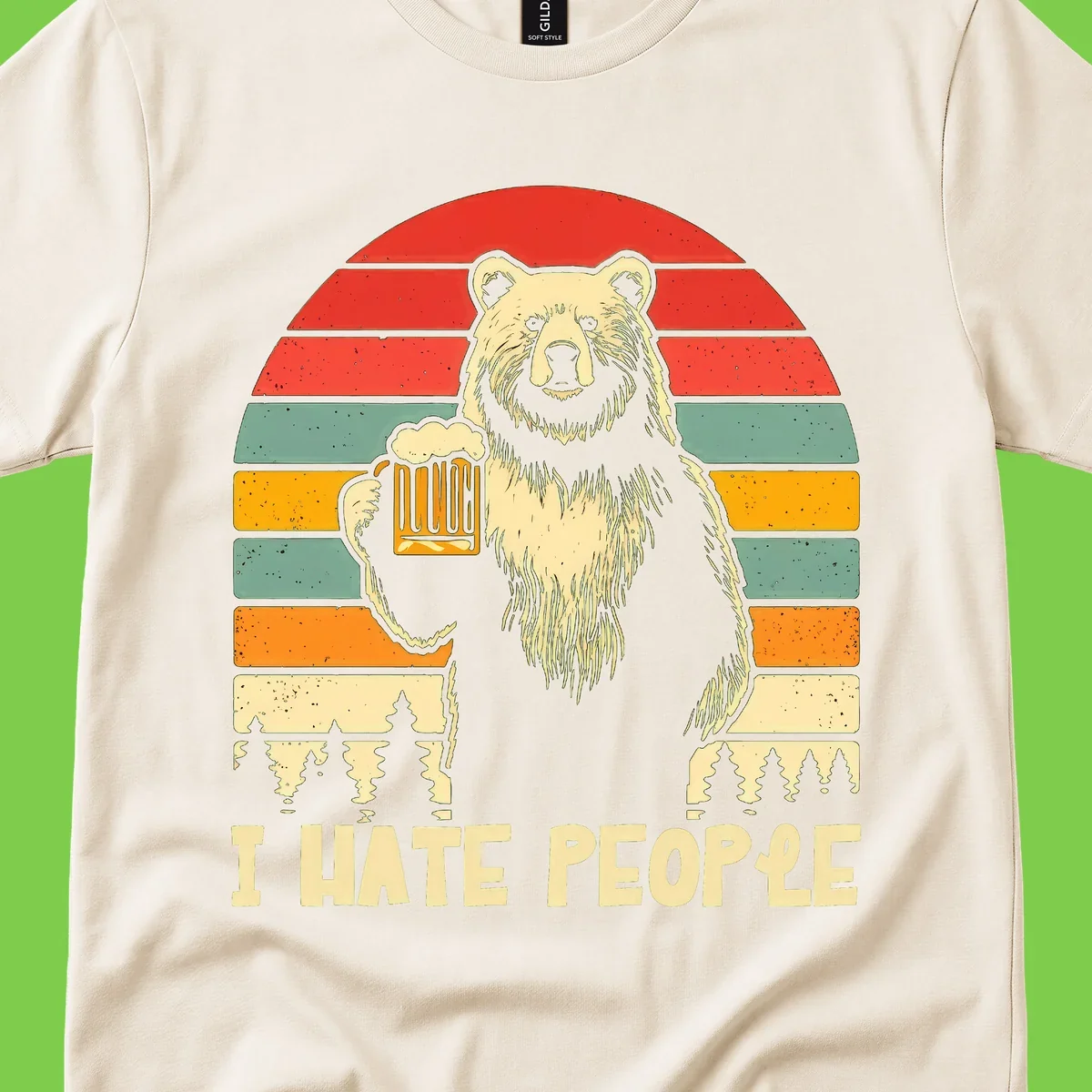 Retro illustration of a grizzly bear holding a beer mug against colorful horizontal stripes with forest and mountain silhouettes, text reads 'I HATE PEOPLE'