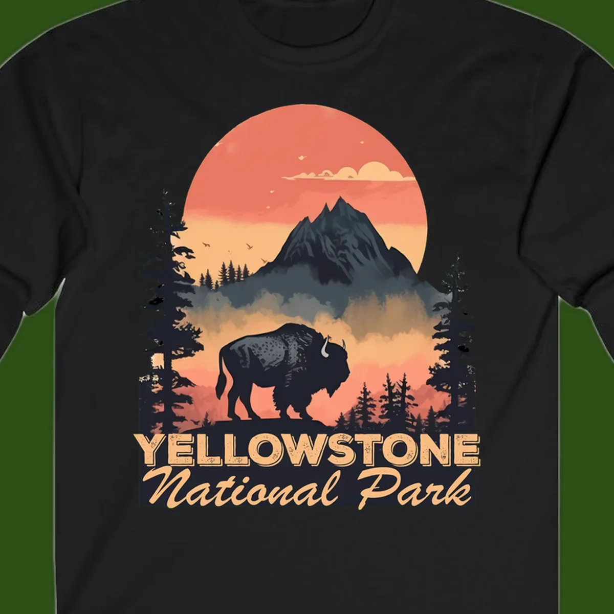 Yellowstone bison national park design: silhouette of a bison in misty forest with mountain peak and sunset sky