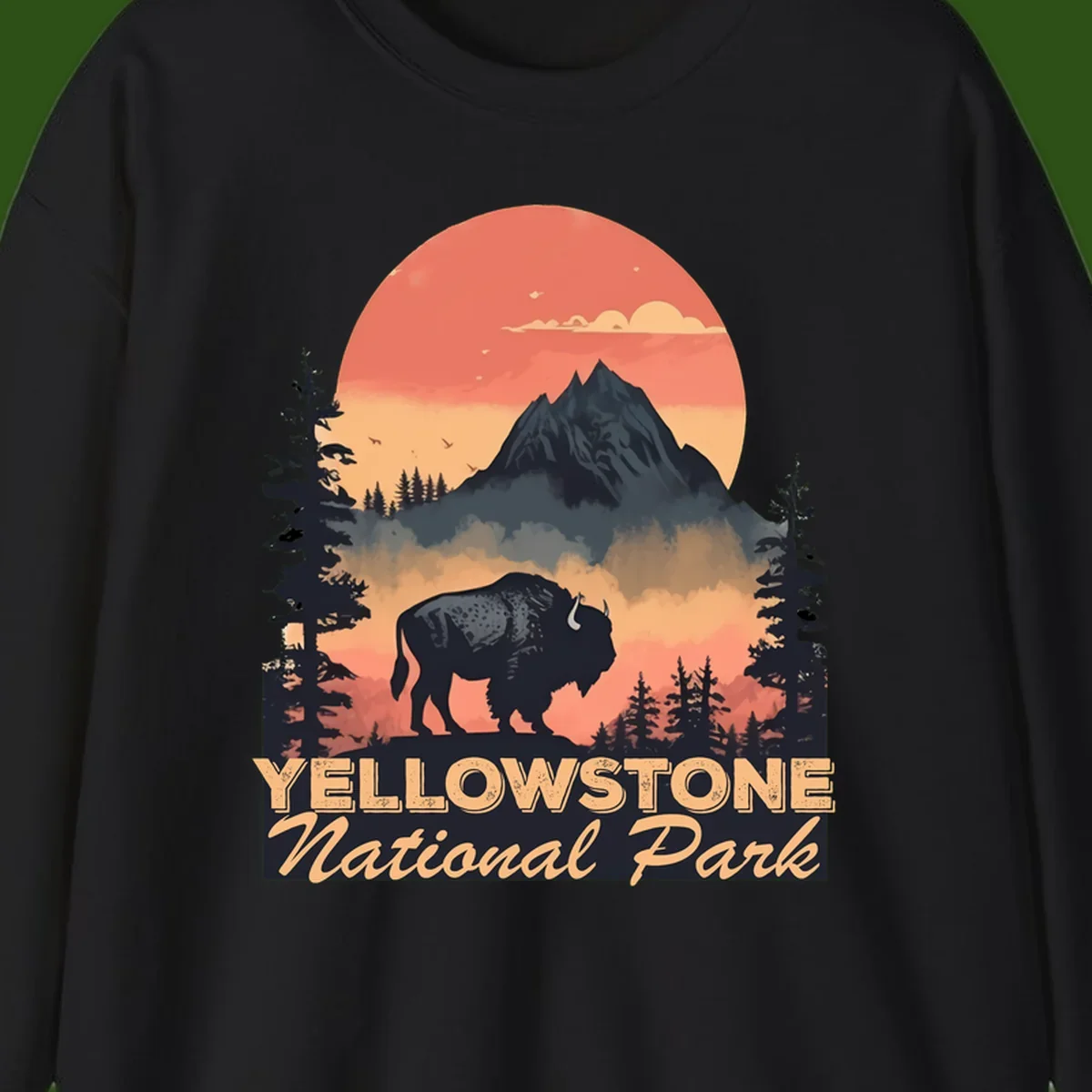 Yellowstone bison national park design: silhouette of a bison in misty forest with mountain peak and sunset sky