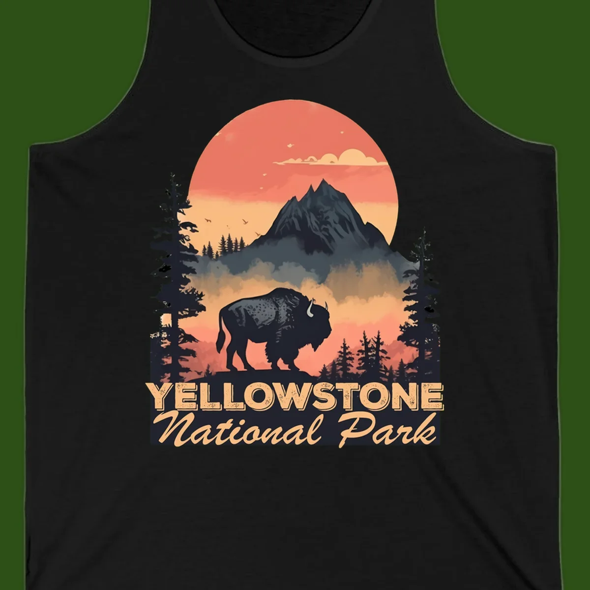 Yellowstone bison national park design: silhouette of a bison in misty forest with mountain peak and sunset sky