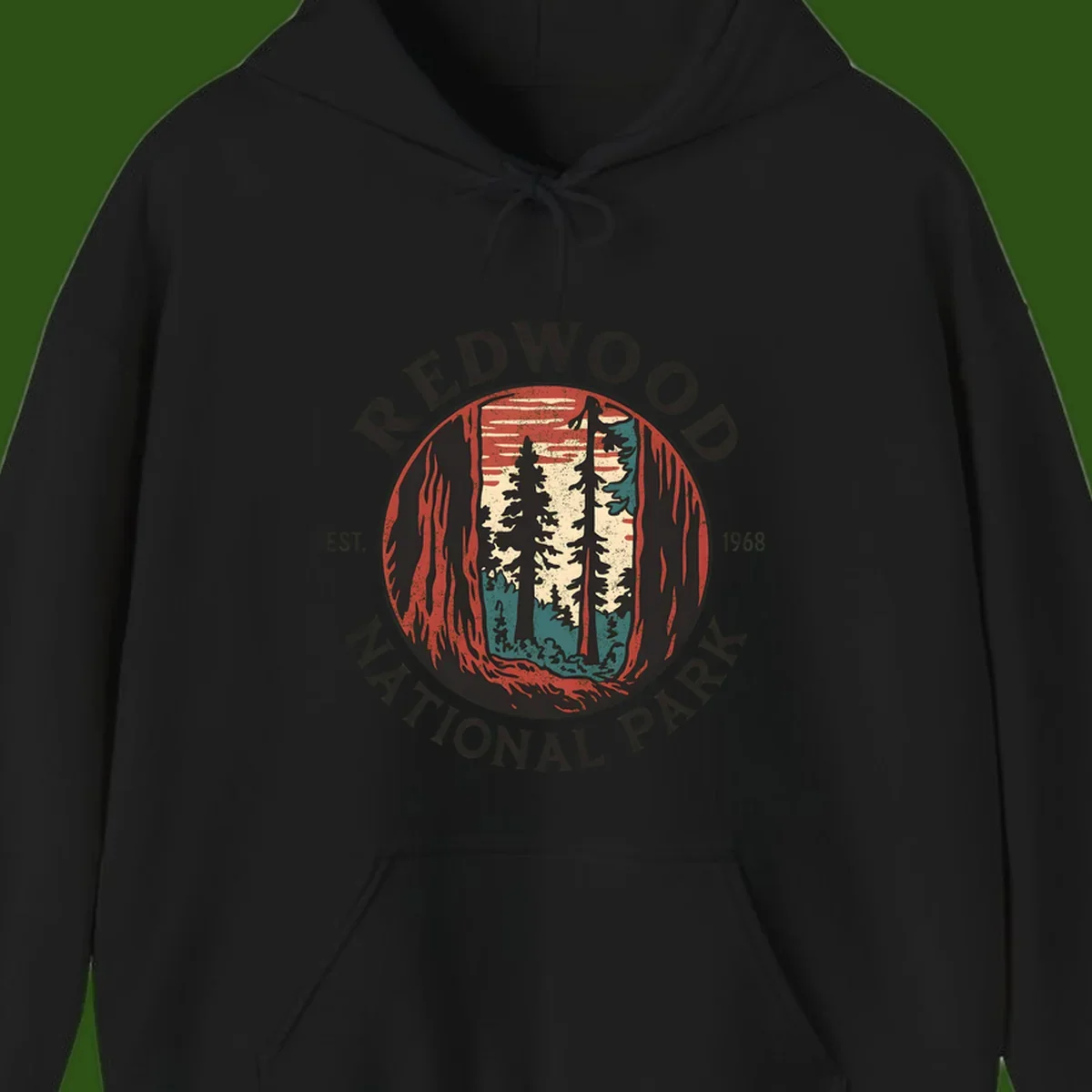 Vintage redwood national park badge design with silhouetted towering trees in circular frame, established 1968