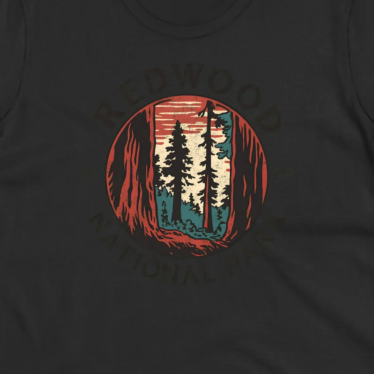 Vintage redwood national park badge design with silhouetted towering trees in circular frame, established 1968