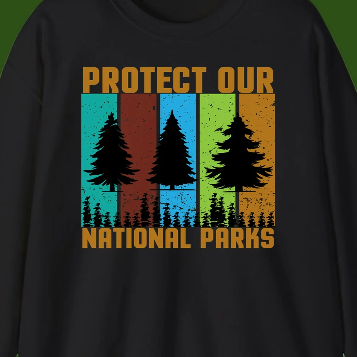 Silhouetted evergreen tree across five colorful panels with text 'Protect Our National Parks' promoting forest conservation.