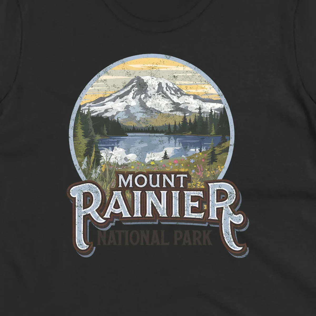 Vintage Mount Rainier National Park badge design with snow-capped peak, alpine lake, evergreen forest, and wildflowers on distressed background